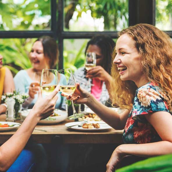 A man standing in front of a red circle.